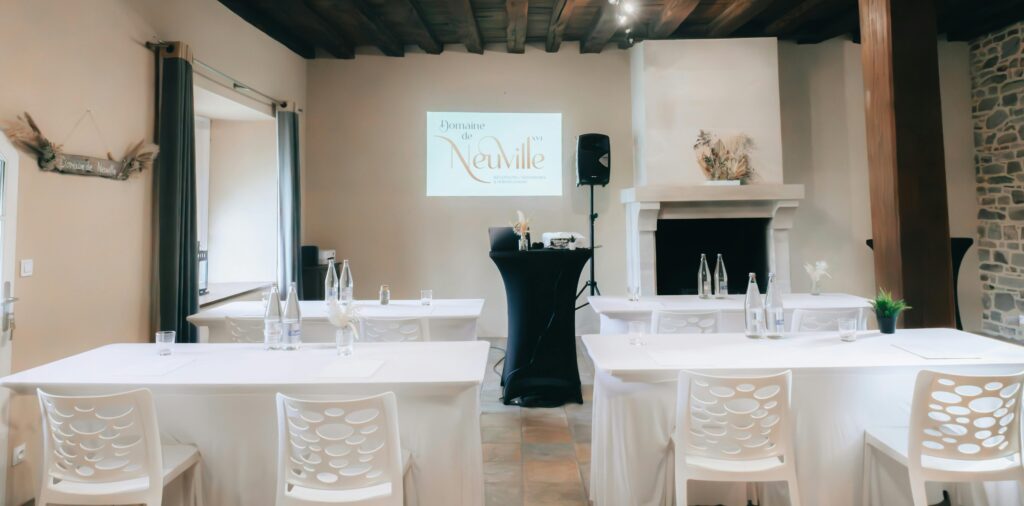 A sophisticated conference room setup with elegant decor and presentation screen projection.